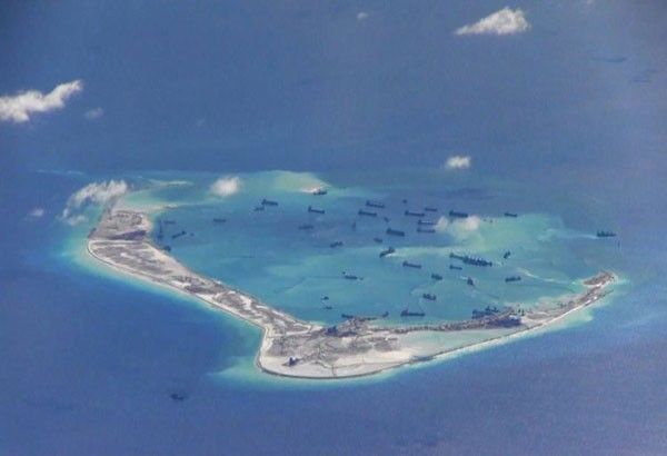 Duterte saying China â��ownsâ�� West Philippine Sea isles?