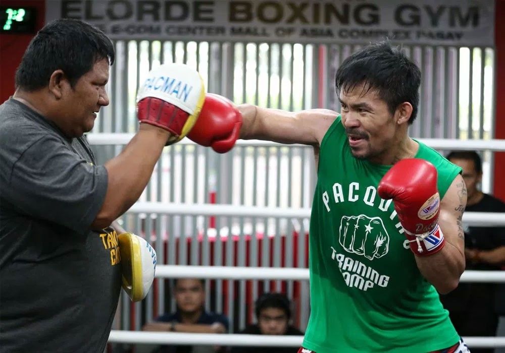 Manny Pacquiao relaxed, happier during training â�� Fortune