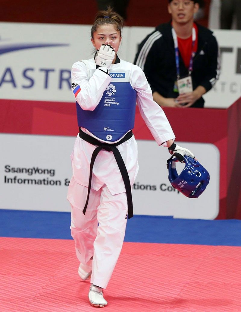 Pauline Louise Lopez bows to tall Chinese, nets 4th taekwondo bronze