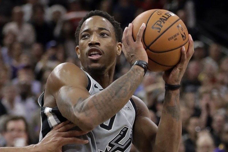 DeRozan, Gay tow Spurs to victory over Jazz