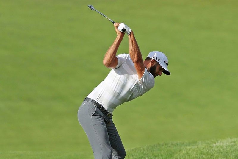 Dustin Johnson, 3 others grab US Open lead