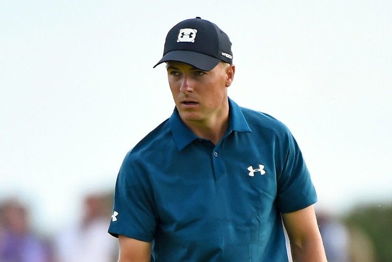 Spieth joins lead, nears repeat