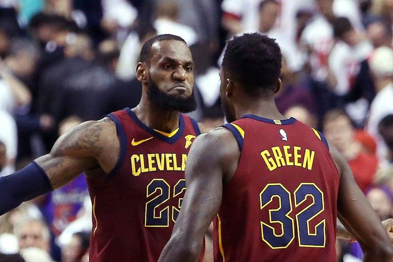 James, Cavs steal home edge in OT