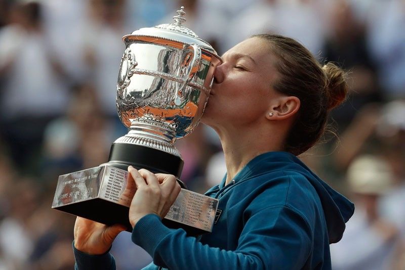 Halep rallies to snatch title from the jaws