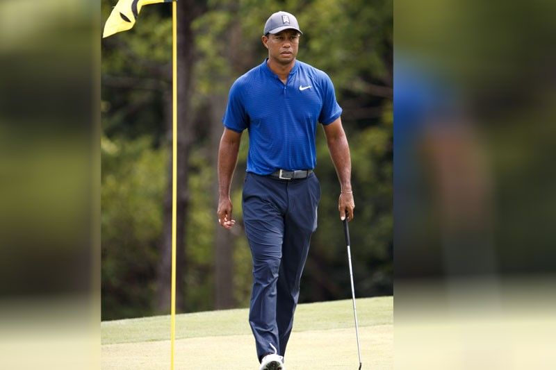 Tiger Woods still casts giant shadow as PGA opens