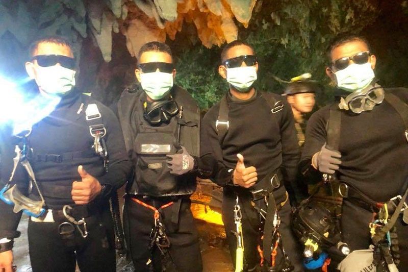 'Everyone is safe' after daring rescue of 13 in Thai cave