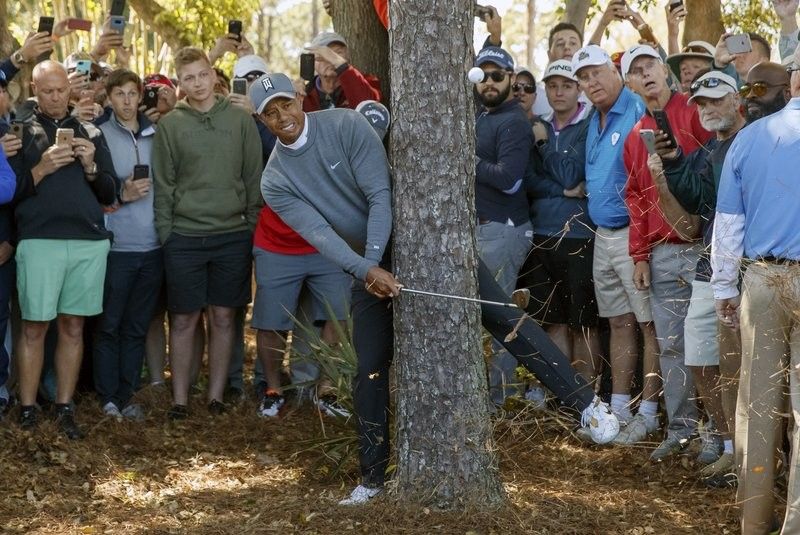 Woods has come a long way from Memorial Day arrest