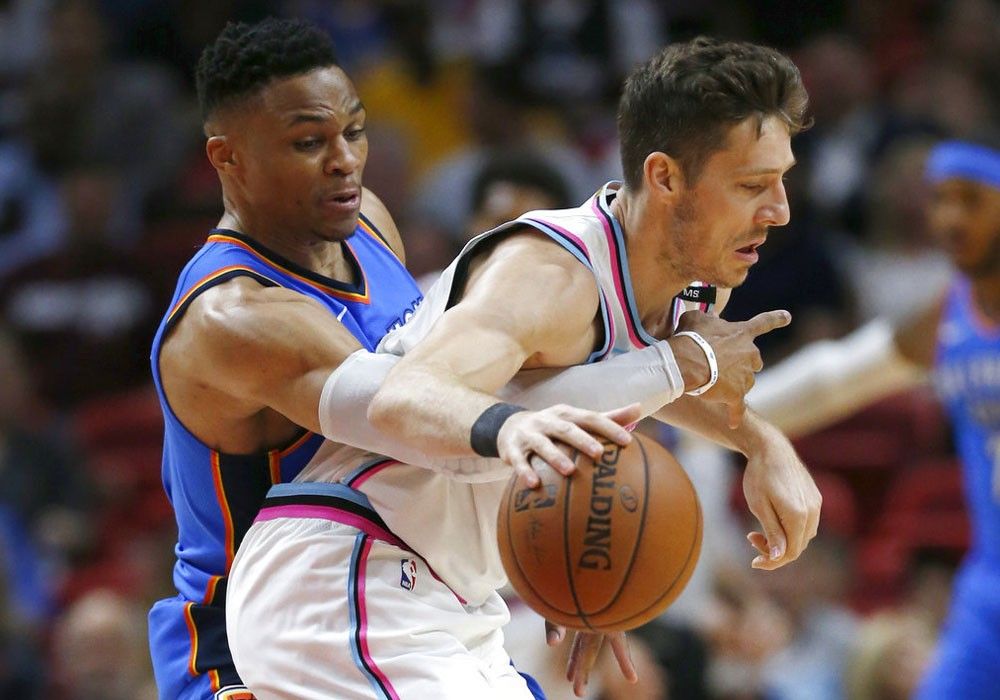 Thunder douse Heat, clinch playoff spot