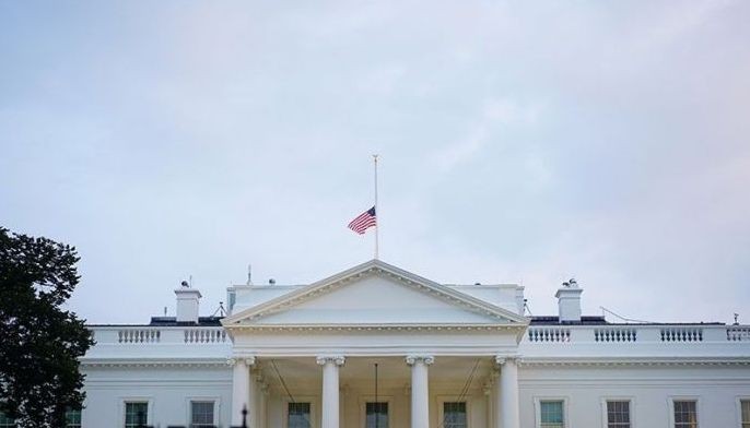 Trump, under pressure to honor McCain, orders flags to half-staff