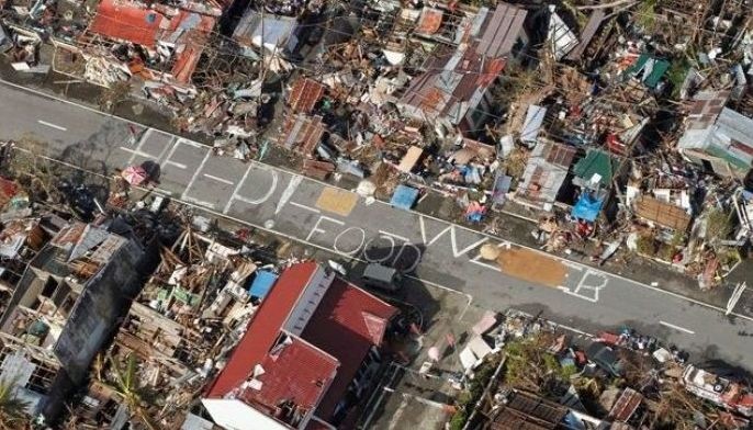 Duterte not satisfied with Yolanda aid, orders housing execs