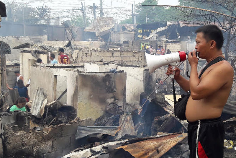  Fire in Subangdaku: Victims seek Digongâ��s help in â��arsonâ�� probe  