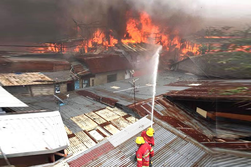 338 houses gone in separate fires  