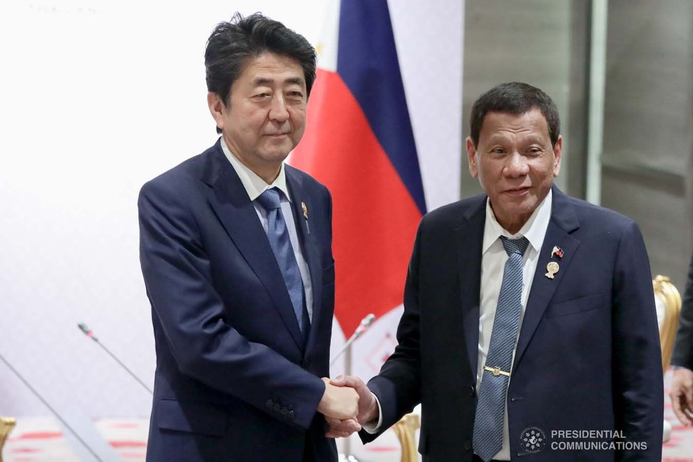 President Rodrigo Duterte and Japanese Prime Minister Shinzo Abe pose for posterity prior to the start of their bilateral meeting at the Impact Exhibition and Convention Center in Nonthaburi, Thailand on Nov. 4, 2019.