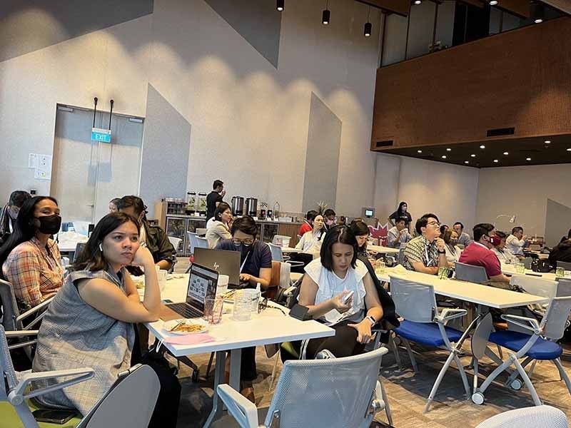 Journalists and fact-checkers at the Google regional headquarters in Singapore