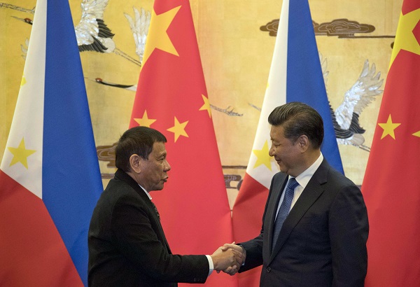 Duterte says he'll set aside sea feud ruling against China 