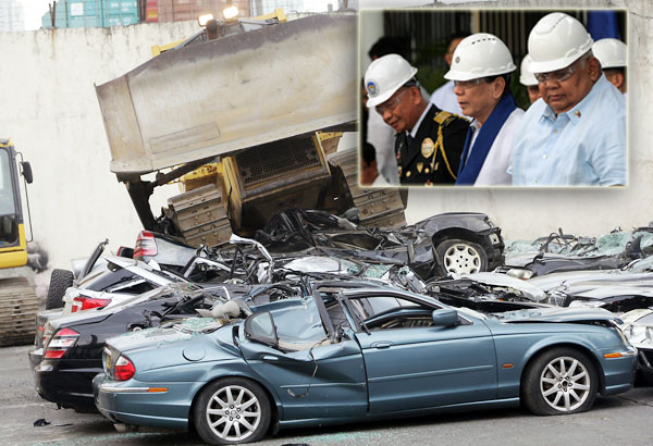 Rody leads wreckage of smuggled cars    