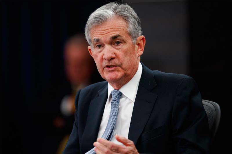 Fed raises key rate and foresees 2 more hikes this year