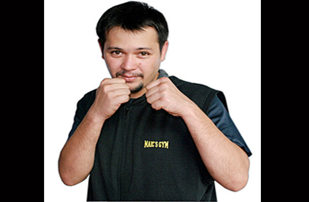 Christopher puts on his boxing gloves