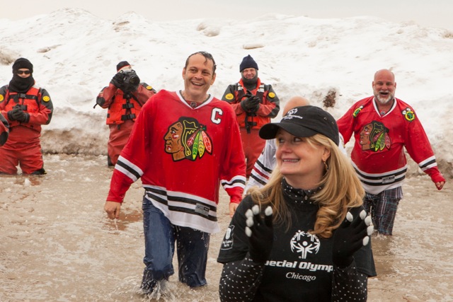Actor Vince Vaughn, center left, and Special Olympics Chicago President Casey Hogan take part in the Chicago Polar Plunge at North Avenue Beach on Sunday, March 1, 2015 in Chicago. Photo by Barry Brecheisen/Invision/AP