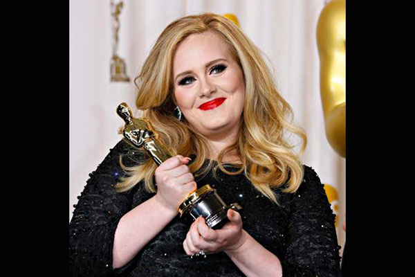 Adele is back, teases new album