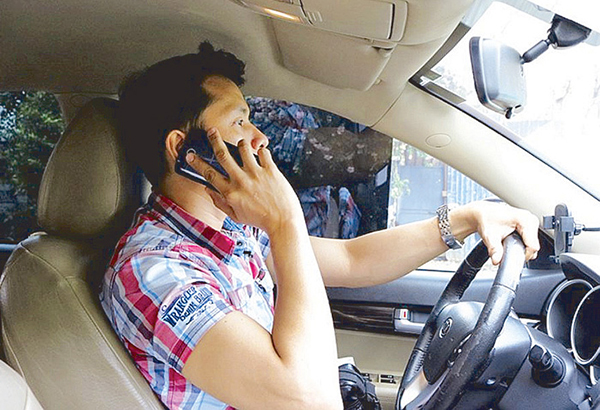 Mobile phone use while driving now banned    