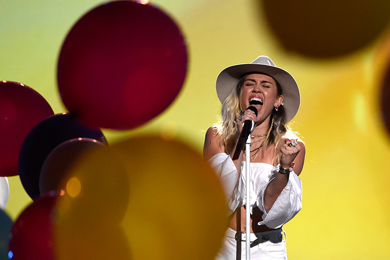 Softer Miley Cyrus performs at Billboard Awards 