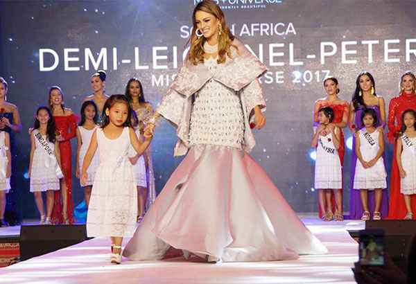 IN PHOTOS: Miss Universe queens shine in Mindanao fabrics