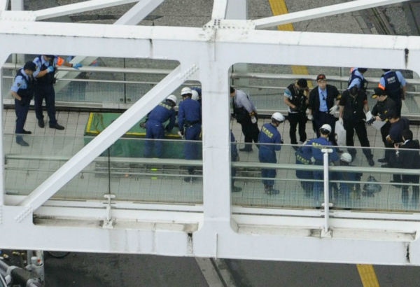 Man sets self afire in apparent protest vs Japan defence policy changes