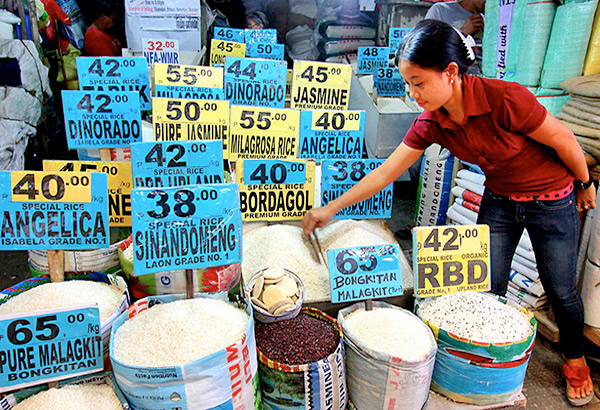 Removing quantity restrictions on rice imports could slash price by P7, DOF says