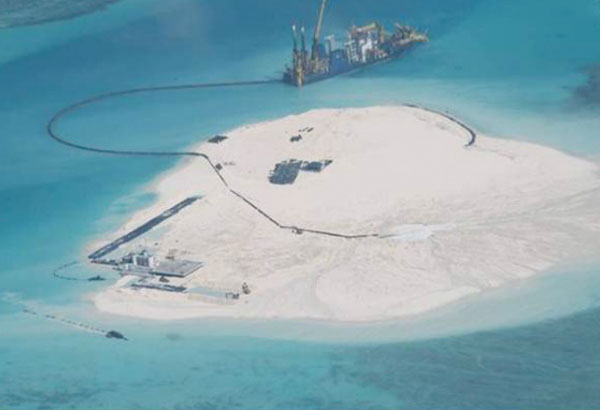 China building harbor on reef
