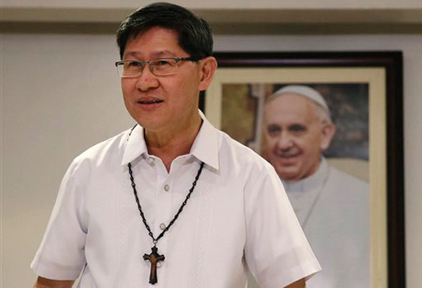 Pope's Filipino host is a humble, rising church star