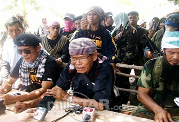 BIFF gunman wearing SAF shirt is cousin of Umbra Kato