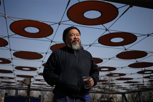 China returns passport to Ai Weiwei, who plans London trip