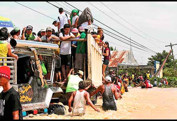Death toll rises to 30 as Lando weakens further