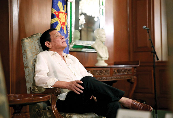 Duterte busy with paperwork, aide says