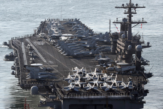 US carrier strike group docks in Manila for port call