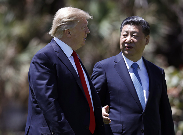 China's Xi promises reform in event with US business leaders
