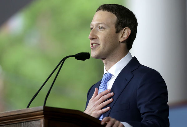 Zuckerberg urges Harvard grads to build a world of 'purpose' 