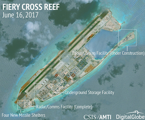 Contrary to Roque's remark, China structures on man-made islands grew under Duterte's nose