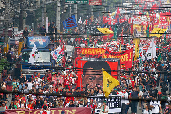 IN PHOTOS: Thousands protest martial law, killings under Duterte