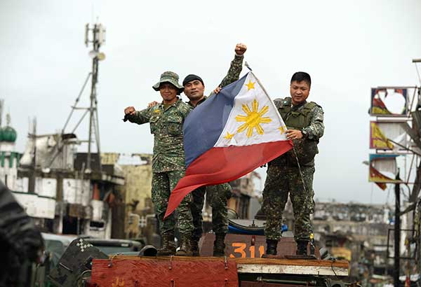 Martial law stays â�� AFP