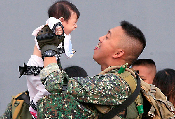 More troops reunited with families   