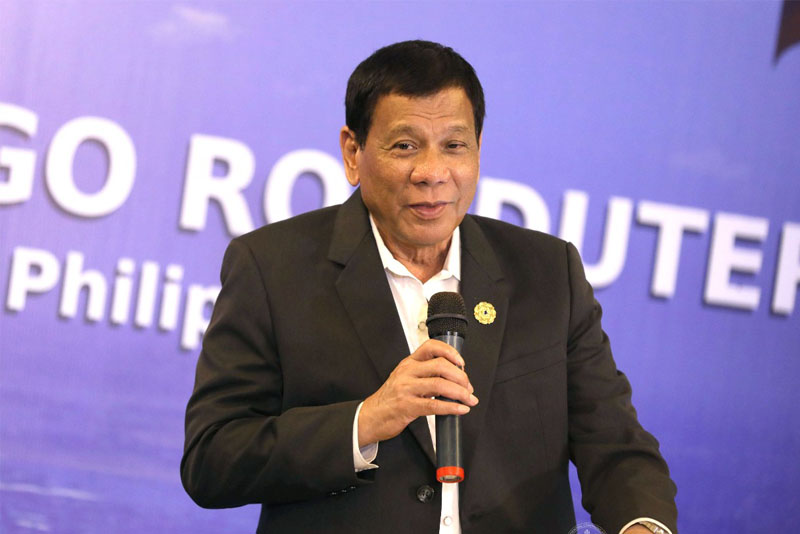 'Colorful language': Duterte tells Pinoys in Vietnam he killed at 16