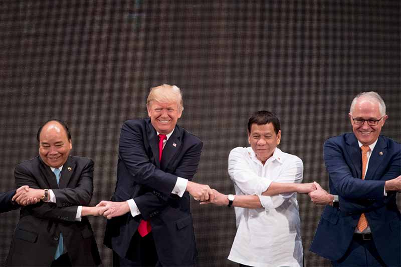 ASEAN handshake stumps Trump