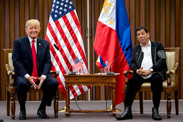 Duterte calling media 'spies' gets chuckles from Trump