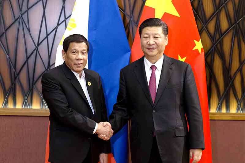 China assures Philippines: No military force in South China Sea