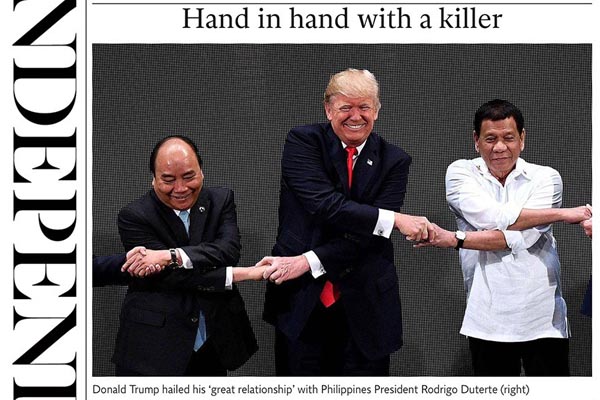 â��Hand in hand with a killerâ��: British paper describes photo of Duterte, Trump