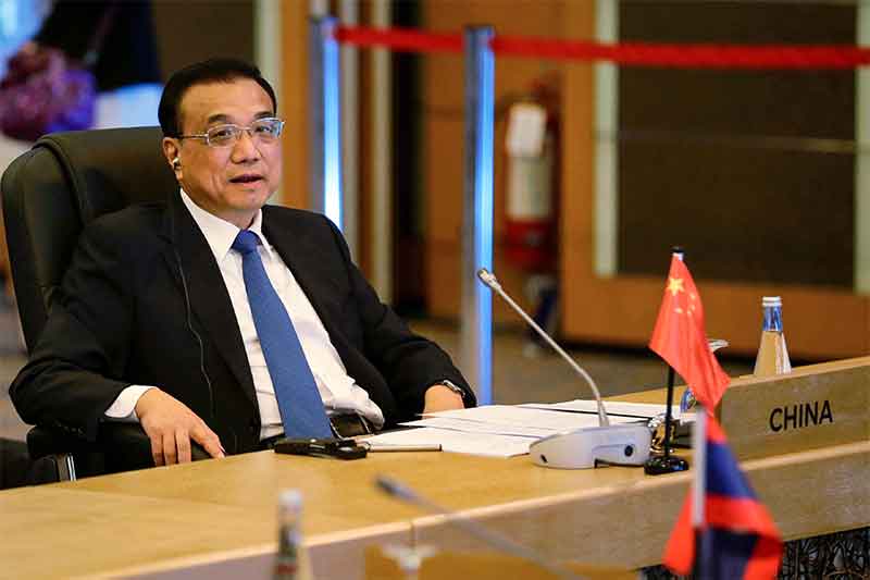 ASEAN goes soft on China as sea code talks start