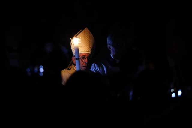 Pope in Easter Vigil baptizes Nigerian migrant-hero