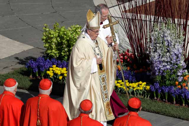 Pope celebrates Easter Mass in packed St. Peter's Square